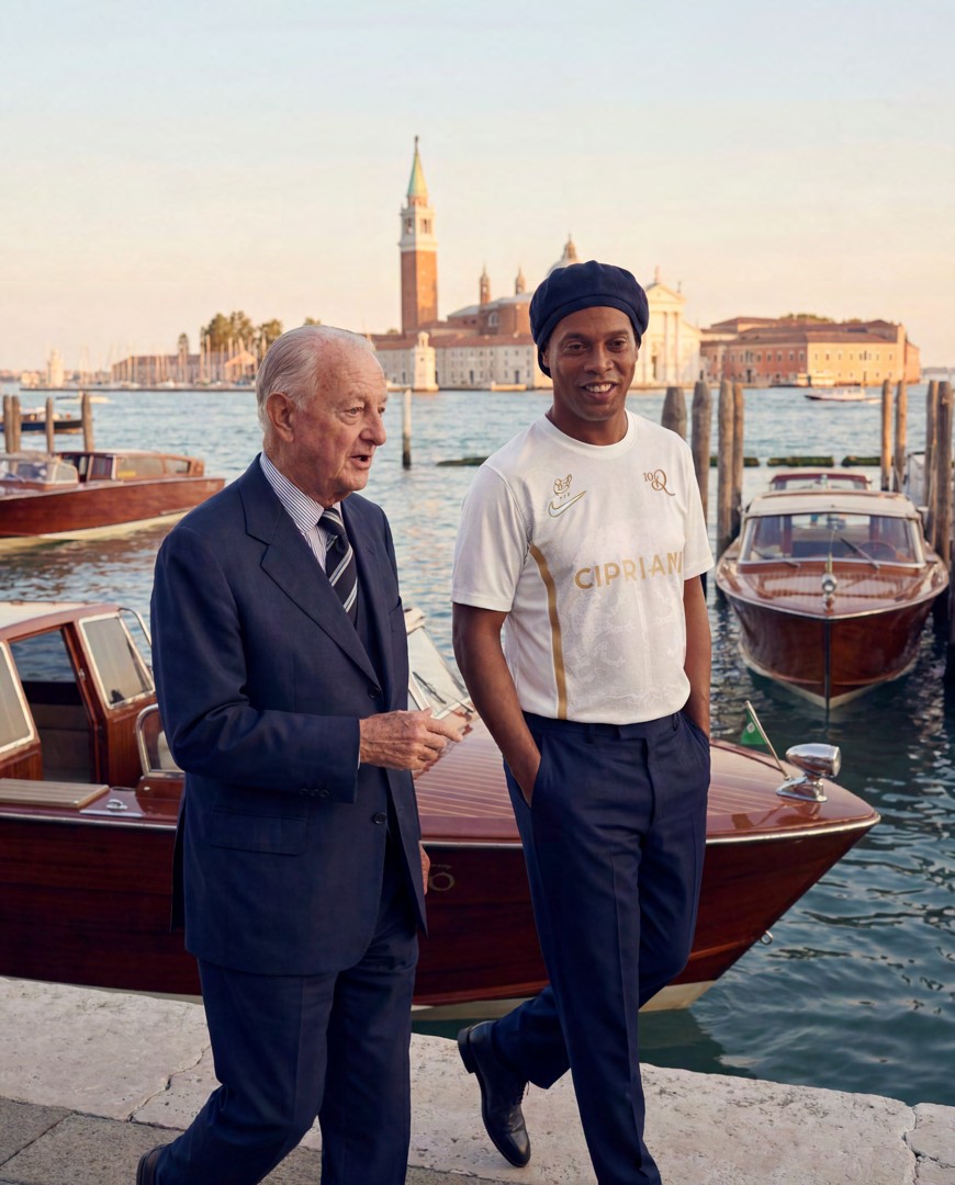 Ronaldinho walking by the water in Venice with Ravenna FC leadership